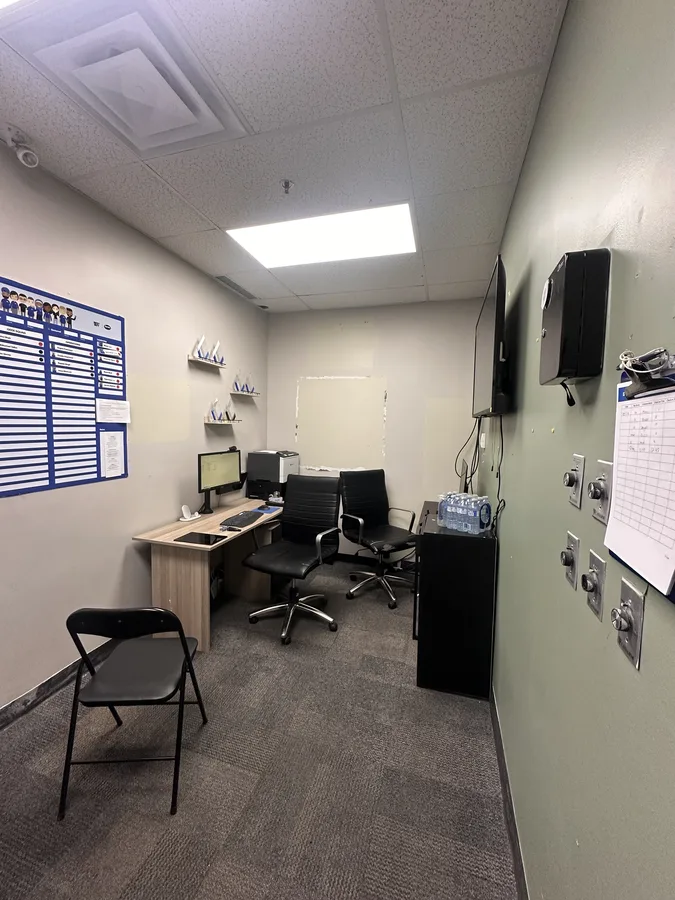 Commercial office with bright blue walls before repainting