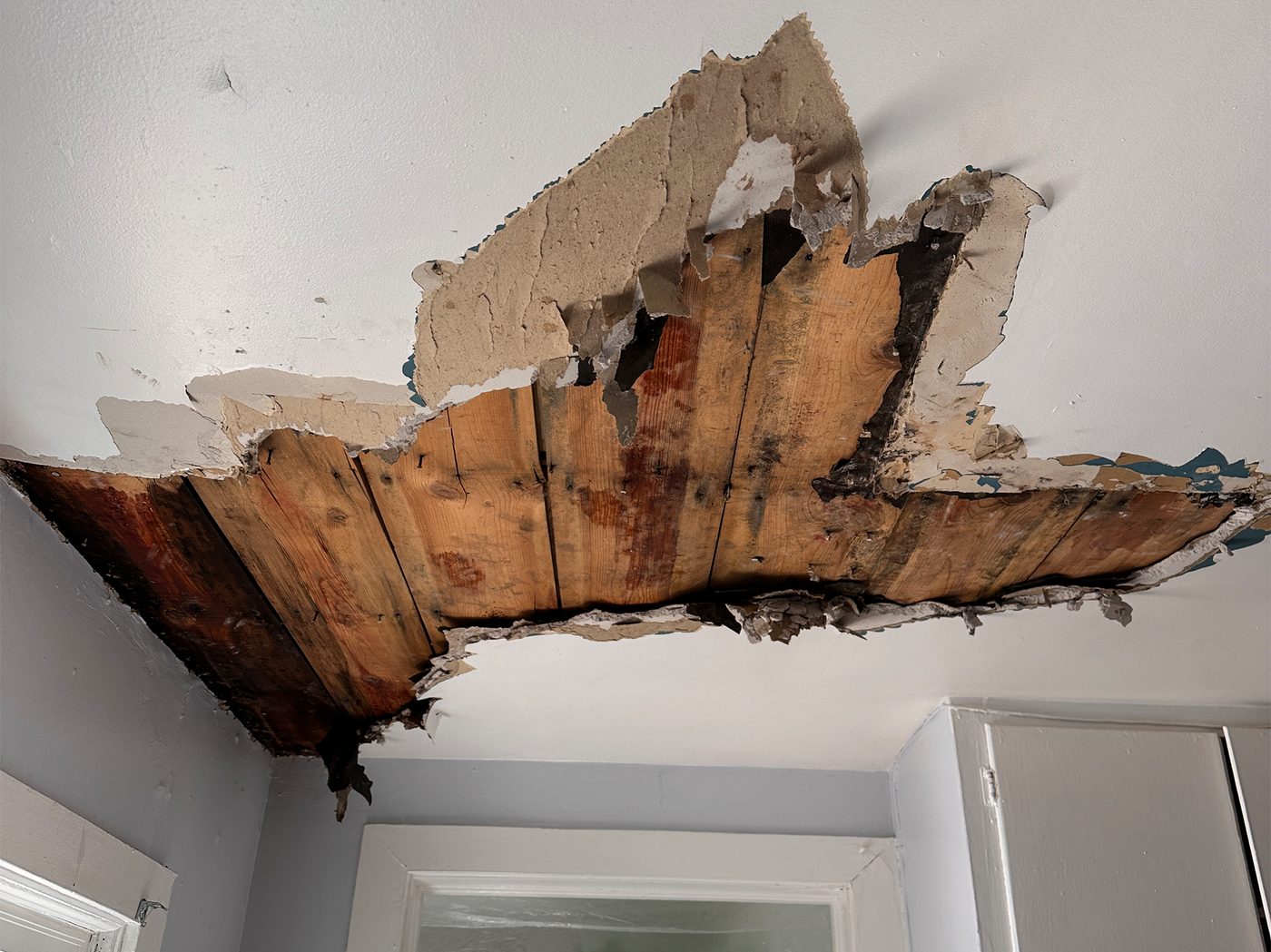 Water-damaged ceiling before repair