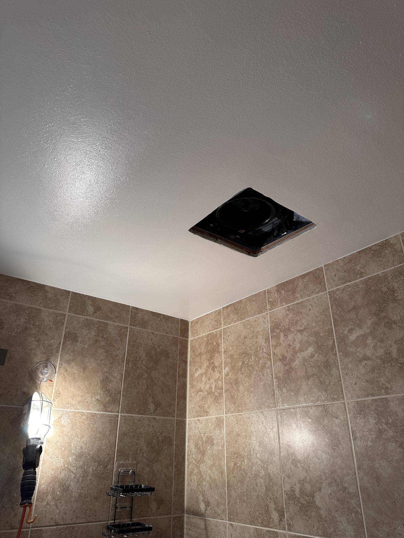 Bathroom exhaust fan and duct replaced, drywall repaired and ceiling repainted