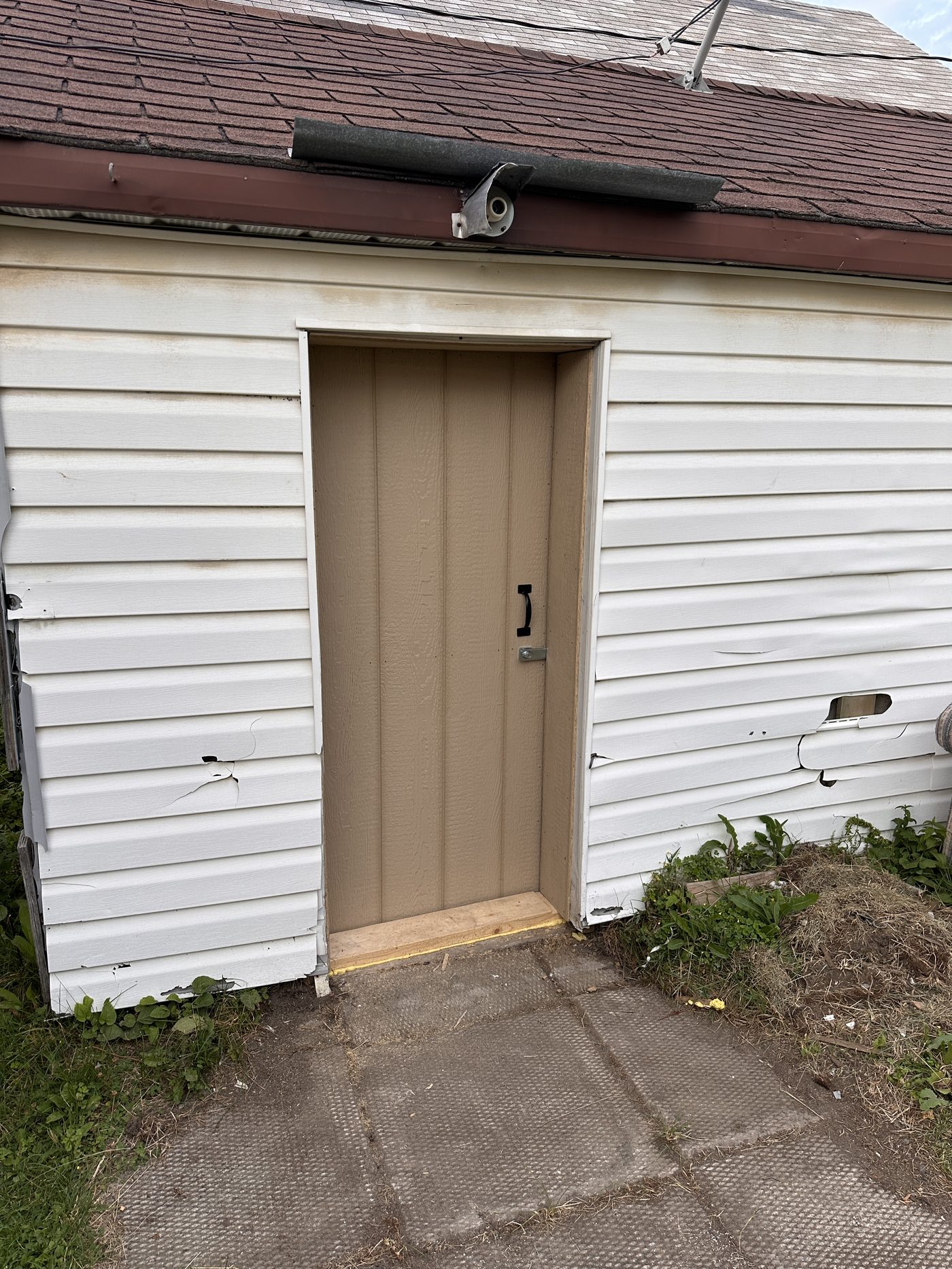 Custom side garage door installed