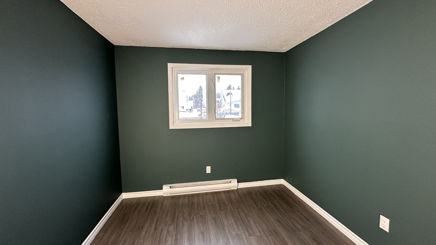 Interior painting after - ceiling yellowed from smoking, repainted