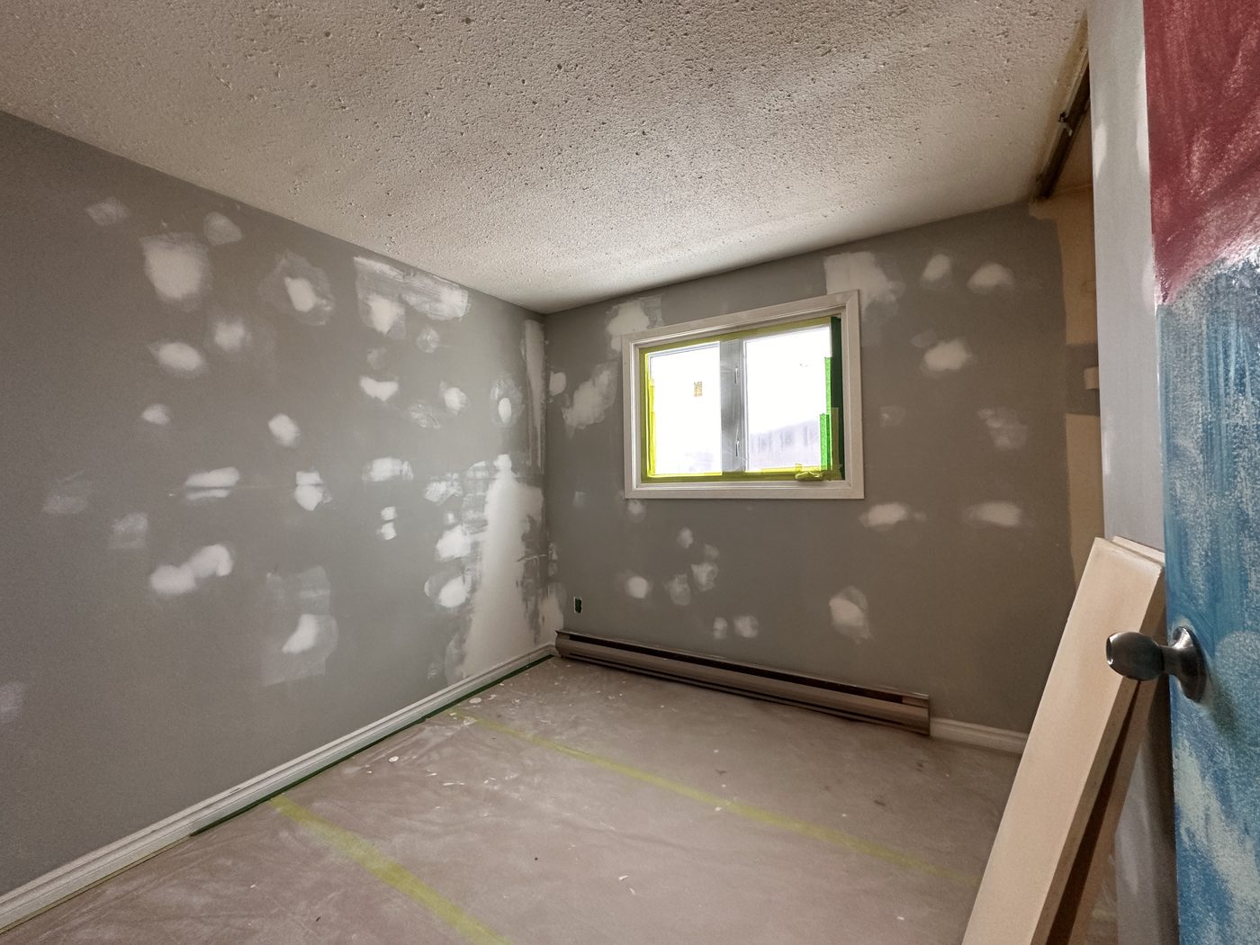 Interior painting before - large hole in wall