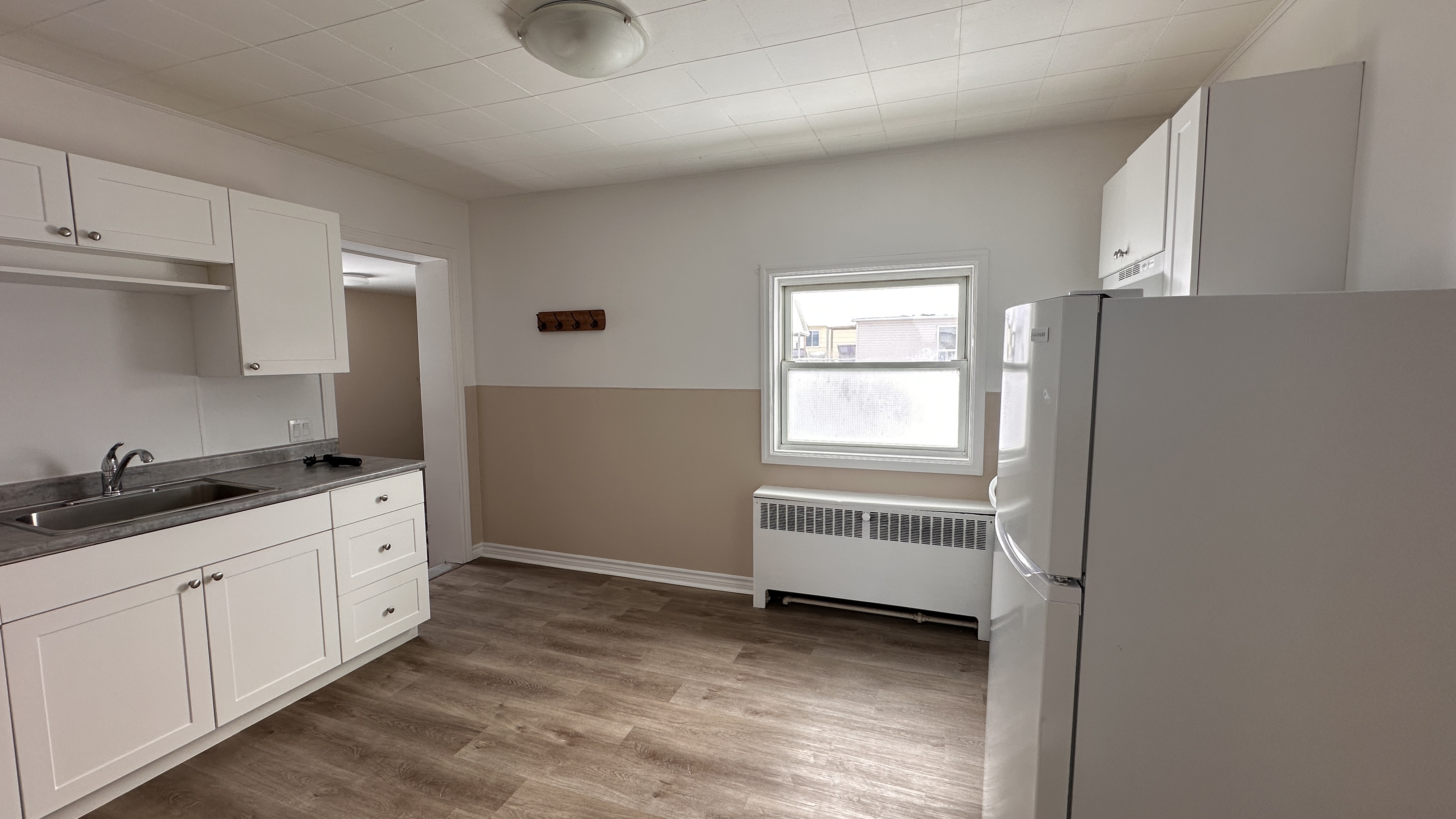 Before and after painting - rental-ready project in Timmins ON - OV Property Solutions